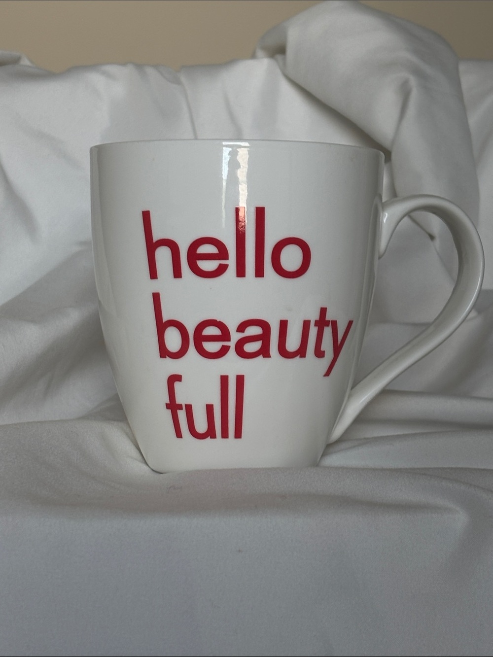 White Ceramic Coffee Mug with Red "hello beauty full" Text